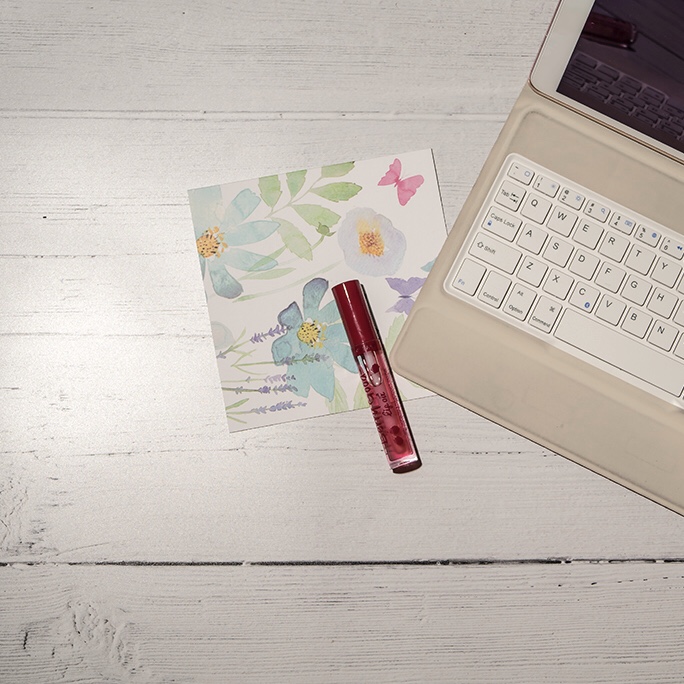 Kick start your self care routine - laptop and lip gloss